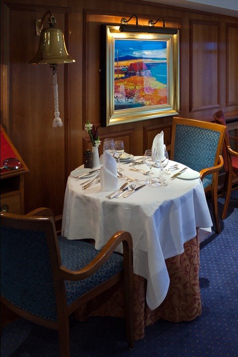 A table setting for two at the ship