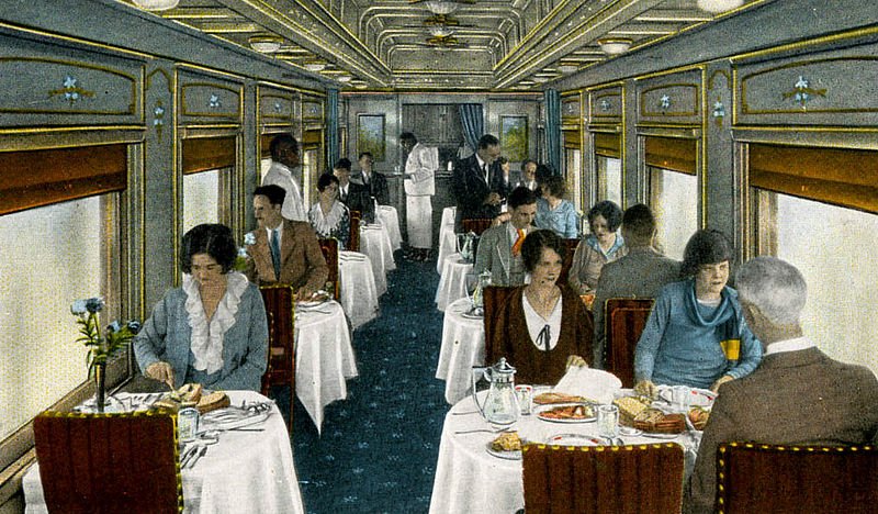 A postcard depicting the dining car on the Columbine train, with passengers dining