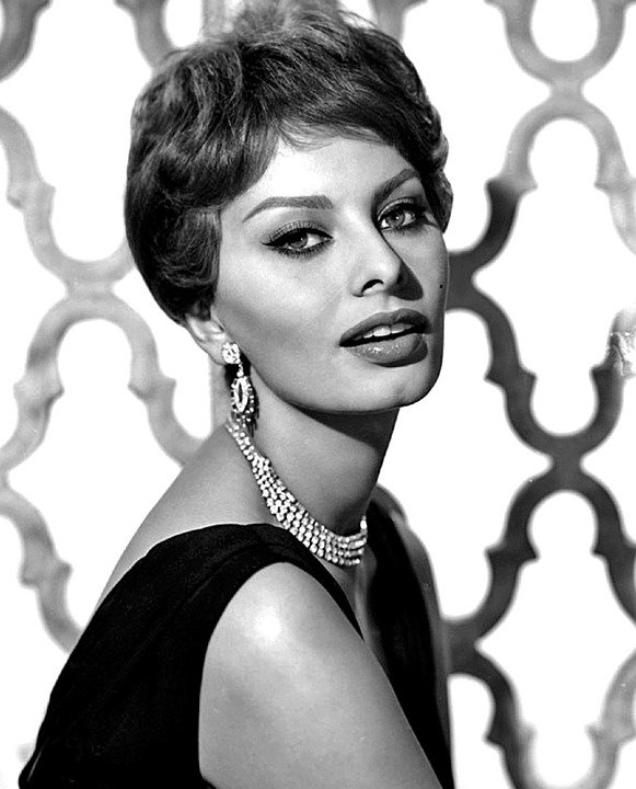 Sophia Loren wearing a black dress and sparkly accessories