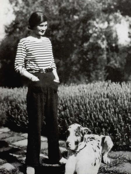 Chanel wearing a sailor's jersey and trousers in 1928