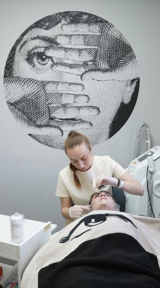 A woman having a facial treatment